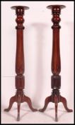 An excellent pair of Victorian large mahogany torchere - plant stands.