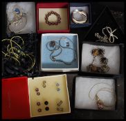 A collection of ladies silver and white metal necklaces in presentation boxes etc ( see