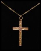 A 9ct gold ladies necklace with 9ct gold hallmarked chase decorated crucifix pendant.