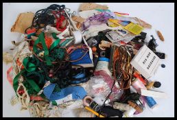 A large quantity of sewing equipment, needles, threads,