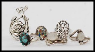 A collection of 6 silver 925 rings to include moonstone set, turquoise set, , lattice work,