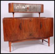 A vintage 1950's vaneered sideboard / bar,