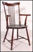 A Victorian beech and elm Windsor nursing chair.
