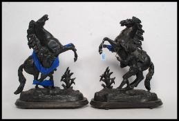 2 19th century spelter figurines of marley horses being raised on wooden plinth bases H45cm