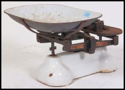 A vintage century Industrial pair of  white ' Avery ' shop scales food trough and weights.