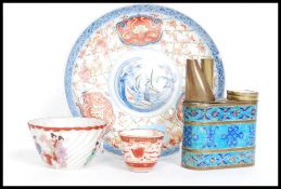 A collection of antique Chinese / oriental items to include tea cup,