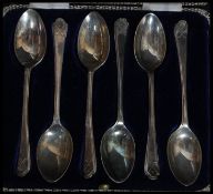 A cased set of six silver hallmarked teaspoons of golfing interest by Walker & Hall.