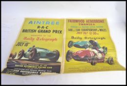 Two vintage reproduction motor racing posters - each with text to top and racing artwork to centre.