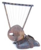 An Spanish Or French 19th Century Wood Iron & Leather Stirrup along with a Polynesian ? musical