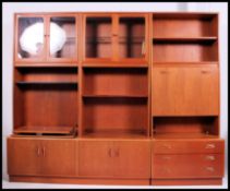 A Large 1970's G-Plan modular 3 section display unit sideboard.