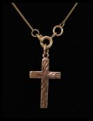 A 9ct gold ladies necklace with 9ct gold hallmarked crucifix pendant. Total weight 2.