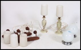 A collection of retro mid century lamps.
