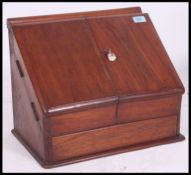 A large Victorian walnut stationary / metamorphic desk tidy.
