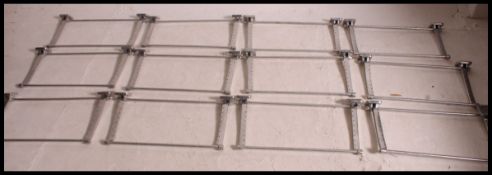 A fabulous set of chrome 12 1970's carriage luggage racks.