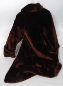A ladies vintage  full length simulated faux fur coat,