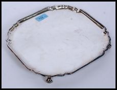 A silver hallmarked salver / card tray with Sheffield assay mark dated for 1964 by makers C J