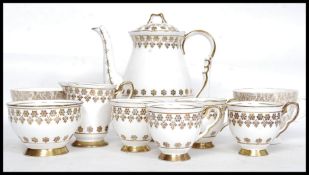 A Royal Stafford ceramic part tea service comprising teapot, cups,