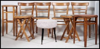 A set of 4 retro 1950's kitchenette dining chairs with original vinyl seats.