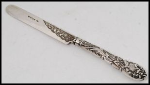 A silver hallmarked berry knife.