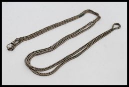 A large white metal early 20th century chain linked pocket watch albert chain with clasp. Unmarked.