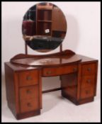 A 1930's Art Deco dressing table chest  of drawers.