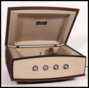 A retro PYE 1950's stereogram record player complete with instruction manual having space age facia