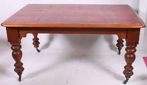 A large Victorian mahogany library table - writing desk.