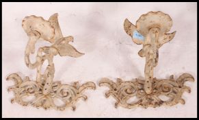 A pair of 20th century Coalbrokedale style candle wall sconces adorned with Bluebirds