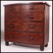 A Victorian mahogany bow front chest of drawers.
