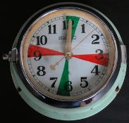 A fabulous 1970's metal bulkhead clock by seiko having decorative facia,