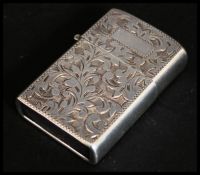 A ladies Silver Zippo style petrol lighter,