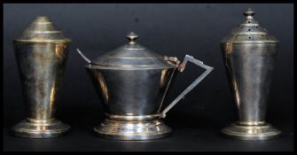 A 1930's Art Deco cased silver plated 3 piece cruet set compising condiments and conserve pot with