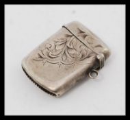 An Edwardian silver hallmarked vesta being chase decorated. Birmingham hallmarks for 1910.