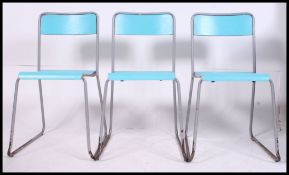 3 20th century Industrial type stacking chairs - workmens club chairs.