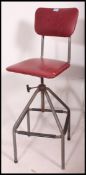A mid century Industrial machinists large swivel stool.