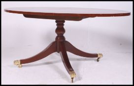 A  20th Century Edwardian revival mahogany inlaid pedestal coffee table,