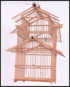 A vintage / retro Chinese bamboo bird cage. 52cm tall.