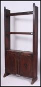 A large French early 20th century Provincial oak bookcase cabinet.