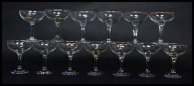 A set of twelve vintage /  retro collectable advertising Babycham glasses,