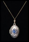 A 9ct gold ladies locket and 9ct gold necklace.