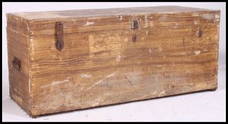 A 20th century scrumble finish Industrial chest - workmans chest. The hinged top with central clasp.