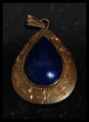 A 14ct gold Lapis Lazuli ladies pendant.