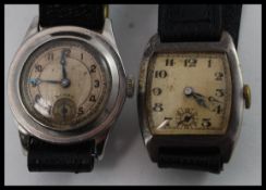 A  silver hallmarked gentlemans vintage wristwatch with 15 jewel movement on leather strap.