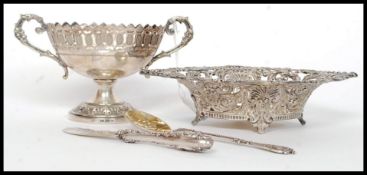 A Victorian silver plated caddy spoon inscribed to verso for 1887 marked Jurst together with a