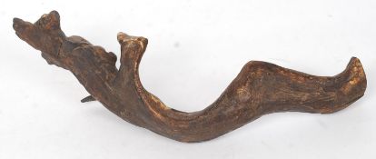 An unusual early 20th century carved hardwood tribal figurine of a Voodoo stick man ( see