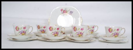 A 20th century Staffords chinta /c floral bone china tea service by Stanley,