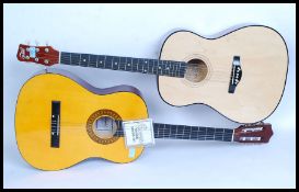 Two six string acoustic guitars,