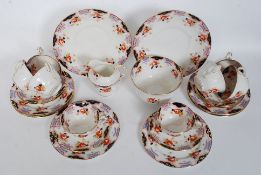 A good early 20th century Imari pattern tea service comprising cups saucers plates etc by Anchor