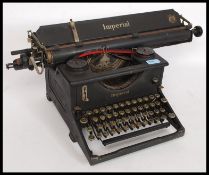 An early 20th century vintage manual typewriter by Imperial, having an A3 roller,