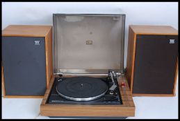 A retro 1970's teak and smoked acryllic record deck model no Mark 4.